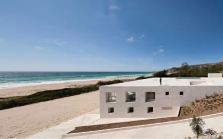 contemporary beachfront villa design with specialist frameless glazing